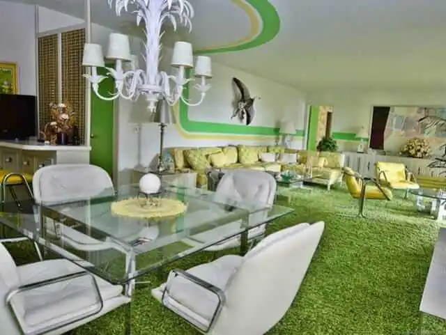 1970s Outdated Home Outdated Home from the 70's that has green carpet, wallpaper all over the walls, very retro - a prime example of an outdated home that needs renovation